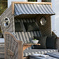 Strandkorb Trendy PURE Greenline 135 XL mit Bullaugen in PE antique white Dessin 755, grau gestreifte Polster im Garten