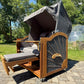 Strandkorb Prieß Modell Meister aus Iroko Holz mit dunkle PE Geflecht und anthrazit grauem Stoff, ideal für den Garten.