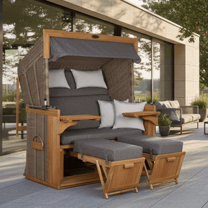 Strandkorb deVries PURE Friesland Sylt Teak PE white kubu Dessin 252 in XL mit Fußstützen und grauen Polstern auf Terrasse