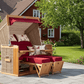 Strandkorb deVries PURE Friesland Sylt Teak PE white kubu Dessin 107 Vögel rot im Garten vor rotem Haus