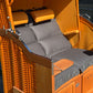 Strandkorb Sonnenpartner Modell Classic PE orange mit gemütlicher Polsterung und Holzdetails im eleganten Design.