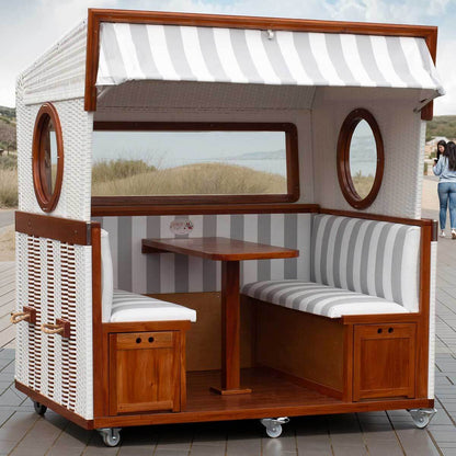 Gosch Lounge Dessin grau weiss 989 - gemütlicher Strandkorb 6-Sitzer mit mahagonifarbenem Holz und weißen Geflecht.