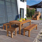Charleston Hocker Teak aus massivem Teakholz auf Terrasse neben Gartentisch, Outdoor Sitzhocker von Sonnenpartner