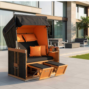 Strandkorb Konsul schwarz orange mit ergonomischem Design und eleganter Optik im Außenbereich.