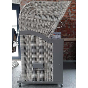 Universal Schutzhülle für Strandkorb Profil Nr. 6, hellgrau, seitliche Ansicht im Innenraum vor Ziegelwand