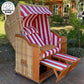 Strandkorb Sonnenpartner Modell Classic aus Holz mit PE Geflecht Naturoptik und rot weiß gestreiftem Dessin 30 im Garten