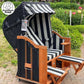 Strandkorb Sonnenpartner Classic schwarz mit Holz, Dessin 93, Fahrrollen, Klapptischen und verstellbaren Fußstützen im Garten