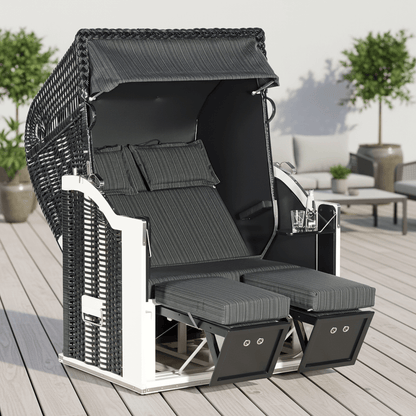 Strandkorb Sonnenpartner Classic schwarz mit weißen Holzteilen und anthrazit Dessin 68, Doppelsitzer mit Fußrasten auf Terrasse