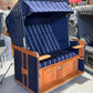 Strandkorb Sonnenpartner Konsul XL blau mit Holz, Nordsee Halblieger 2,5-Sitzer aus PE-Geflecht und Markisenstoff blau weiß gestreift