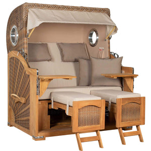Strandkorb Mr. Deko Düne Grande Bullaugen Teak mit komfortablem Design für zwei Personen, ideal für eine entspannte Terrasse.