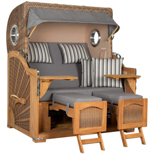 Strandkorb Mr. Deko Düne Grande Bullaugen Teak PE banana 2,5-Sitzer mit grauen Kissen und Holztisch