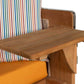 Strandkorb Düne Grande Bullaugen Teak PE banana 2,5-Sitzer detail mit Holzablage und bunten Streifenpolstern