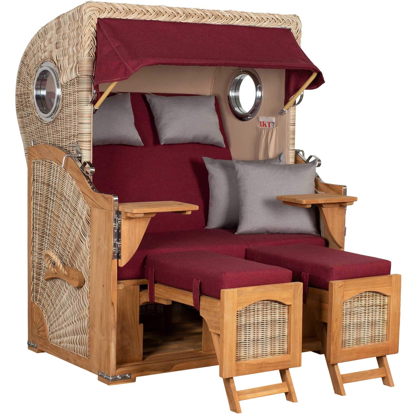 Strandkorb Düne Bullaugen Teak PE shell 2-Sitzer mit roten Polstern und hölzernem Gestell.
