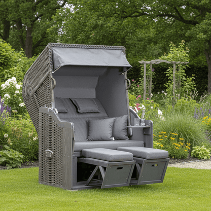 Strandkorb SunnySmart Rustikal 255 Plus grau mit PVC-Geflecht und Fußstützen im blühenden Garten, gemütlicher 2-Sitzer Strandkorb