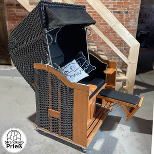 Strandkorb Sonnenpartner Modell Classic mit Nadelstreifen in schwarz-weiss, Holz lasiert und inkl. 2-Kissen.