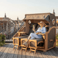 Strandkorb Mr. Deko Düne Grande Bullaugen Teak PE grey 3-Sitzer XXL auf Dachterrasse mit Stadtblick