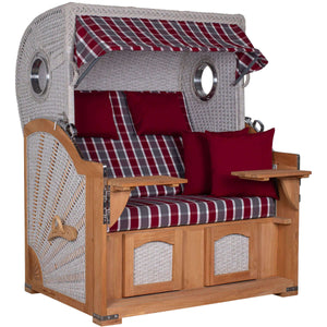 Strandkorb deVries Aruba XL mit rotem Karomuster und komfortablen Kissen, ideal für entspannte Sommertage.