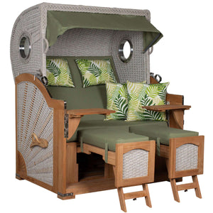 Strandkorb deVries Aruba XL mit Kordel-Geflecht in ivory und grünen Kissen im tropischen Design.