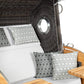 Strandkorb deVries Sailor PURE Teak XL PE stone-grey Dessin 507 Detail mit Bullauge und gemusterten Kissen